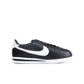 Denim Exchange women's Nike Cortez sneakers in black and white, side view