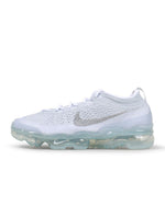 Nike men's Air VaporMax 2023 footwear in Pure Platinum with sleek athletic design and visible air cushioning.