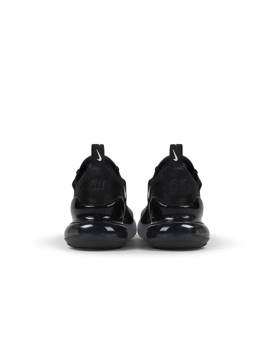 Women's Nike Air Max 270 sneakers in black and white, side view
