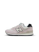 New Balance Women's 574 washed pink sneakers, casual footwear with a soft pink and classic design, suitable for everyday wear.