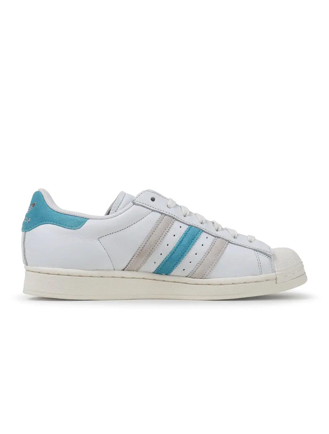 Denim Exchange men's Superstar footwear in preloved blue with classic Adidas styling