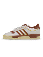 Adidas men's Rivalry Low 86 brown sneakers, low-top footwear with suede and leather accents, casual style for everyday wear.