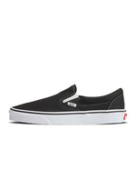 Denim Exchange men's black Classic Slip-On footwear by Vans with signature checkerboard detailing