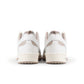 Converse men's Weapon Low sneakers in natural ivory color, showcasing classic low-top design and casual footwear style.