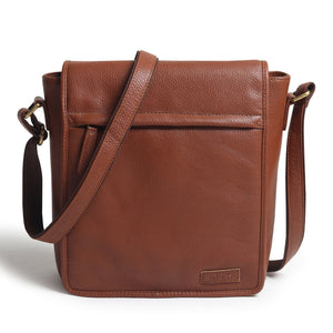 Leather crossbody messenger bag by Classy Leather Bags, designed for travel and work, showing a sleek brown leather strap and spacious interior.