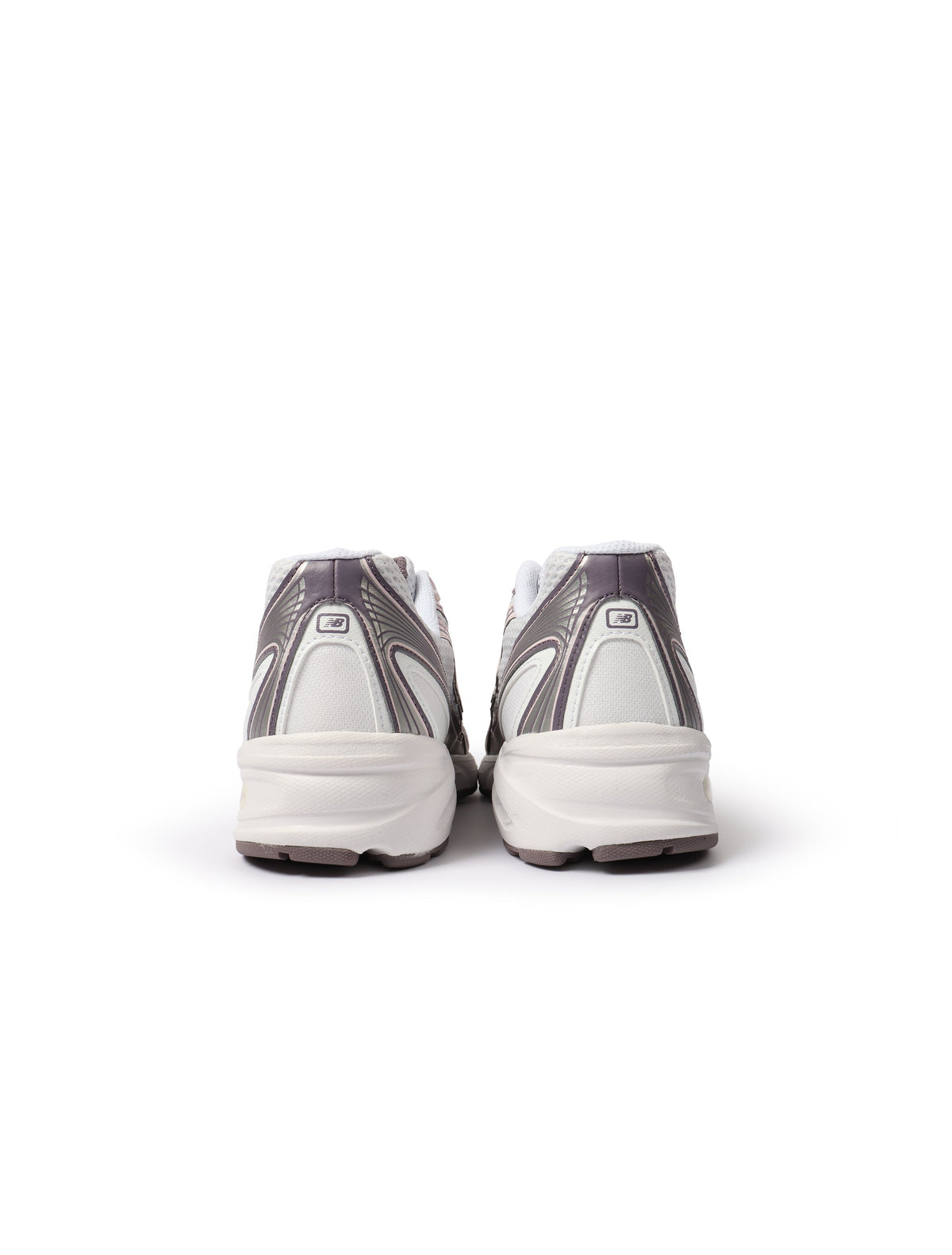 New Balance Women's 740 purple and white athletic footwear, lifestyle sneakers, shown from the side.