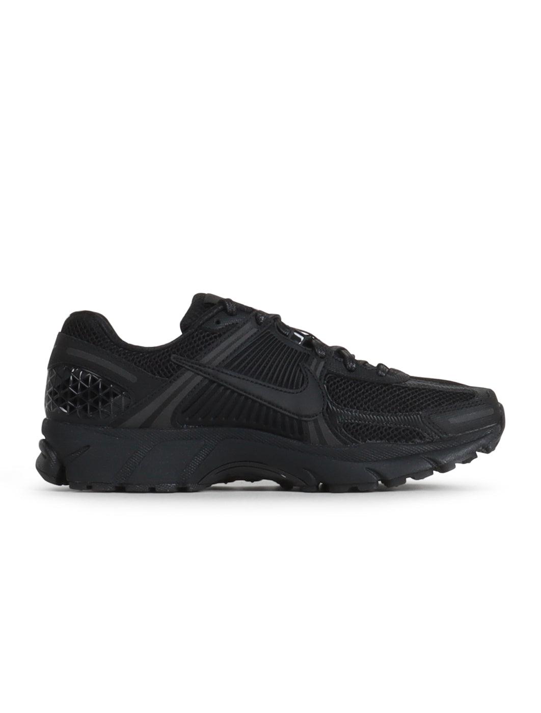 Nike Men's Zoom Vomero 5 Triple Black sneakers by Denim Exchange, side view