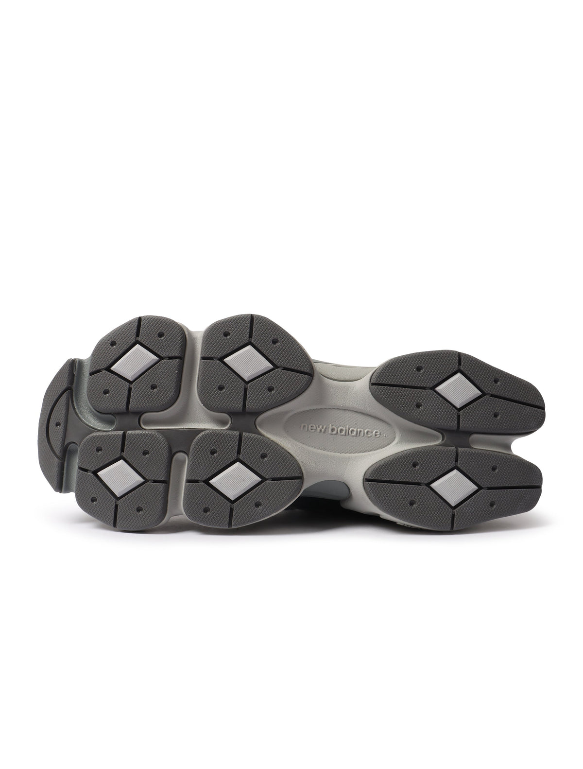 Black and grey New Balance men's 9060 shoes with stylish design, shown from a side angle, perfect for casual and athletic wear.