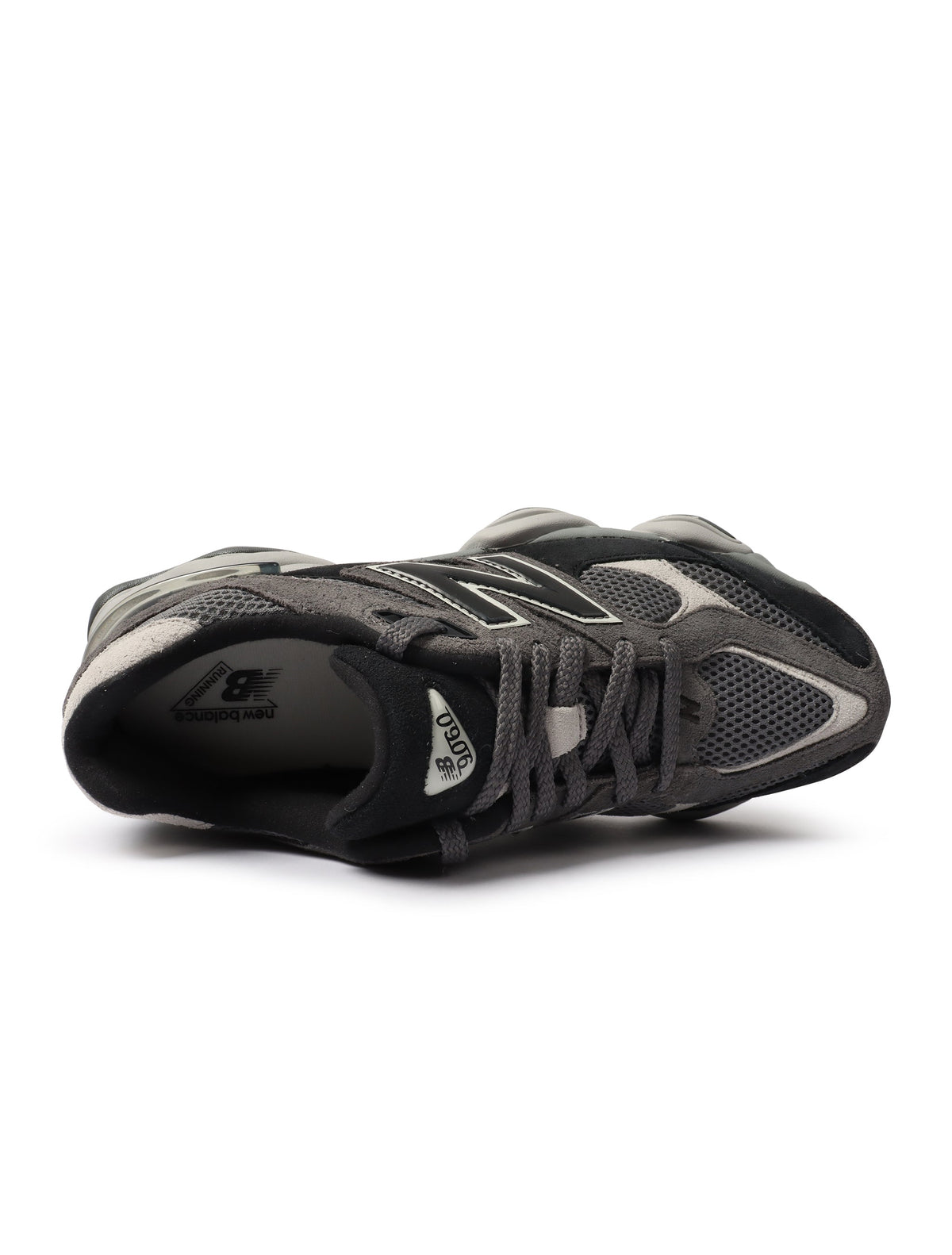 Men's New Balance 9060 shoes in black and grey, stylish athletic footwear with a modern design, perfect for casual wear.