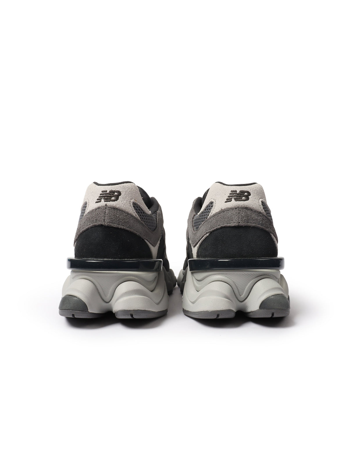 New Balance men's 9060 shoes in black and grey, stylish men's footwear with a modern design and comfortable fit.
