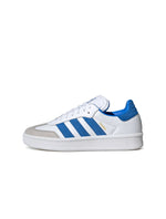 Gradeschool Adidas Samba XLG white and royal sneakers with leather and synthetic upper, rubber sole, and classic sporty design.