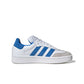 Gradeschool Adidas Samba XLG sneakers in white and royal colorway, featuring classic design and durable rubber outsole.