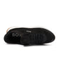 Black Hugo Boss TTNM EVO men's shoes, stylish footwear with sleek design and durable sole, shown on a clean background.