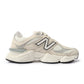 White and grey New Balance 9060 men's lifestyle shoes with sporty design and comfortable athletic style.