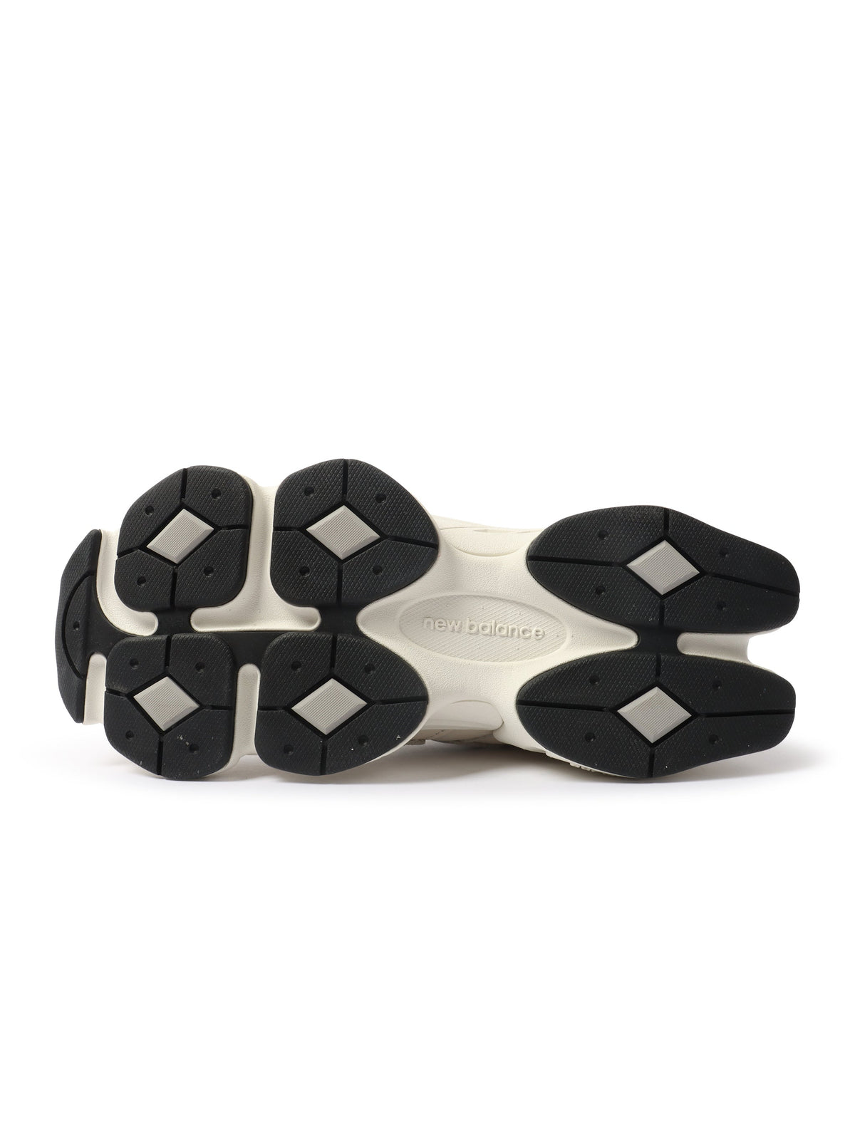 Men's New Balance 9060 lifestyle shoes in white and grey, showing the sleek design and breathable material.