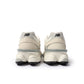 Men's New Balance 9060 Lifestyle Shoes in white and grey with a sleek sporty design, shown on a clean background.