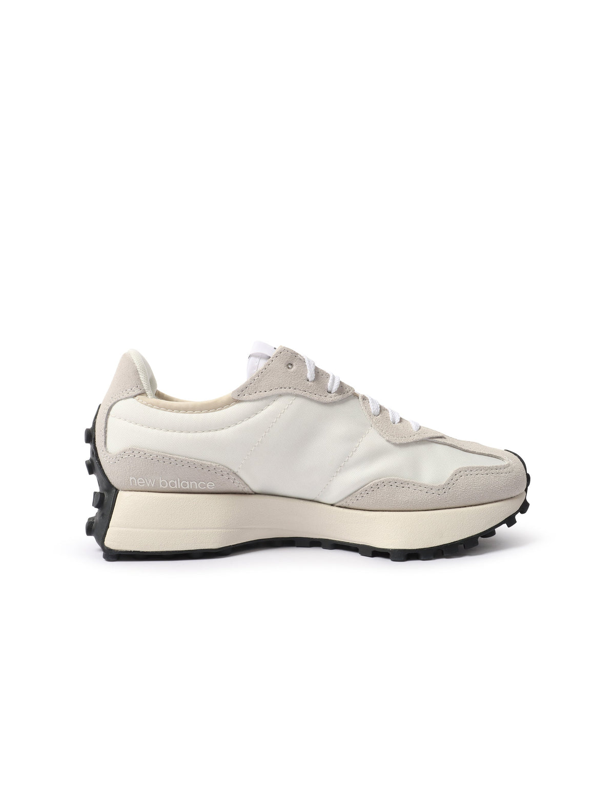 White and black New Balance Women's 327 shoes with stylish design, perfect for casual wear and athletic activities.