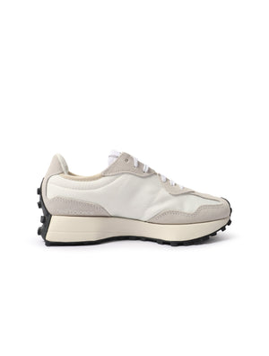 White and black New Balance Women's 327 shoes with stylish design, perfect for casual wear and athletic activities.