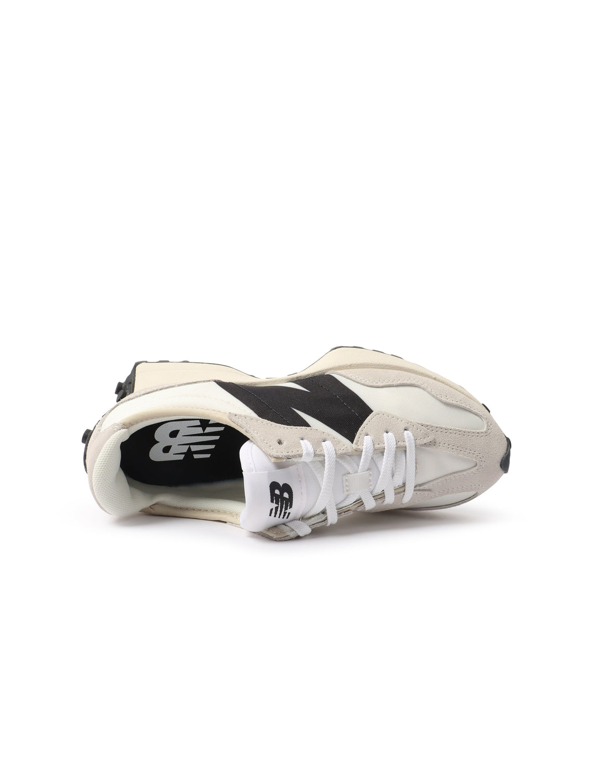 White and black New Balance Women's 327 shoes, stylish casual footwear with a modern design and comfortable fit.