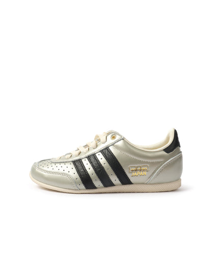 Grey Adidas women's Japan shoes, denim exchange footwear, showing side view with laces and sole detail in natural lighting.