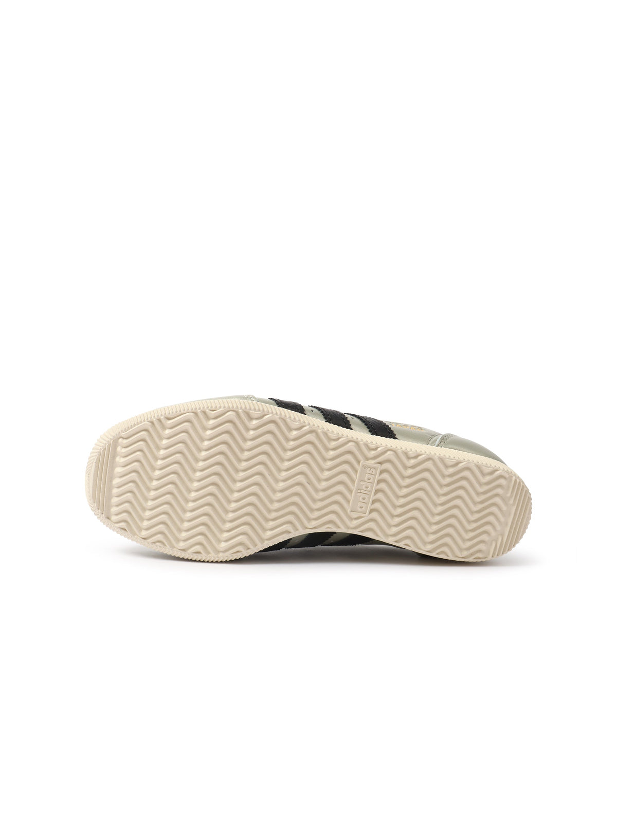 Grey Adidas women's Japan shoes with white accents, showcased on a plain background, highlighting the stylish women's footwear.