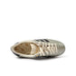 Grey Adidas women's Japan shoes with white soles and laces, displayed on a plain background.