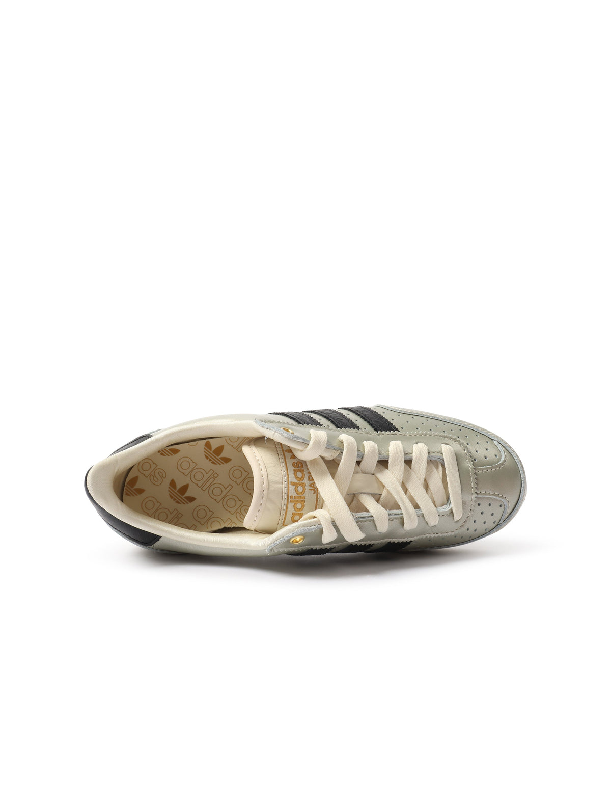 Grey Adidas women's Japan shoes with white soles and laces, displayed on a plain background.