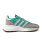 Green Adidas men's Retropy F2 sneakers featuring a sleek design and athletic style, displayed on a plain background.