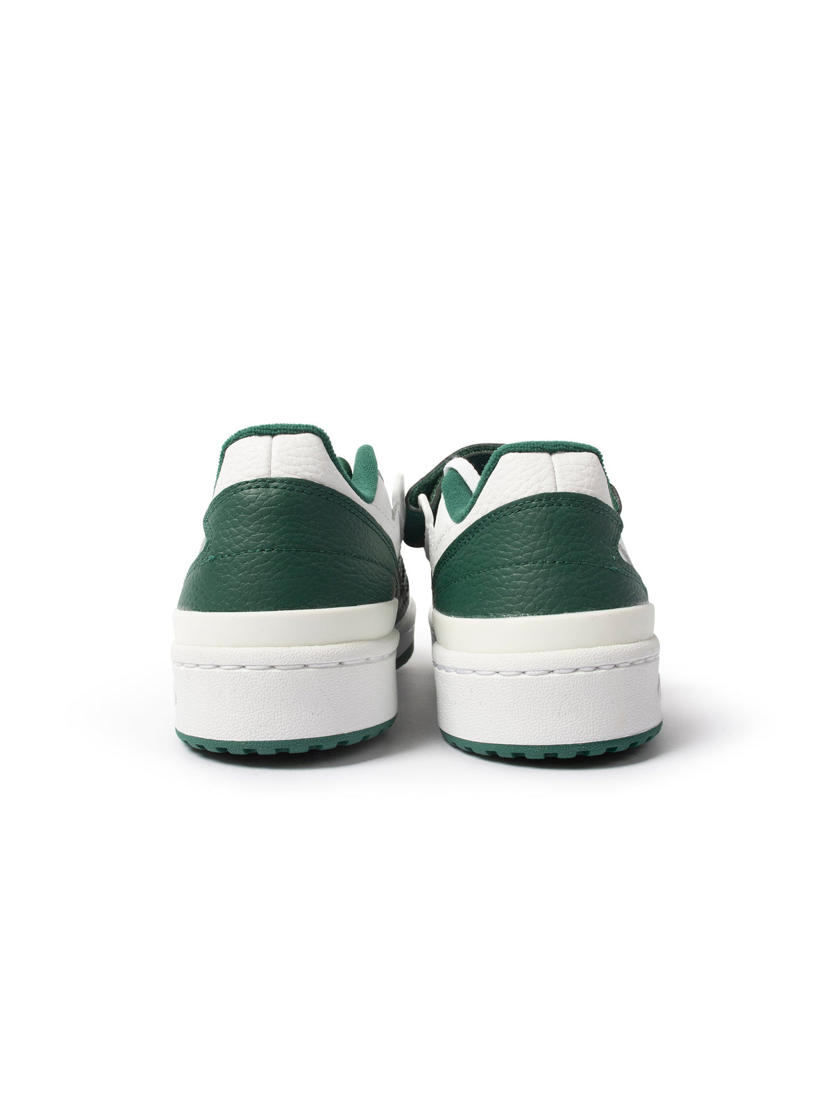 Men's Adidas Forum 84 Low sneakers in white and green, casual footwear with stylish design and comfortable fit.