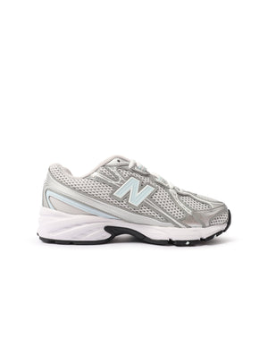 Gray and light blue New Balance Women's 740 athletic shoes on a white background.