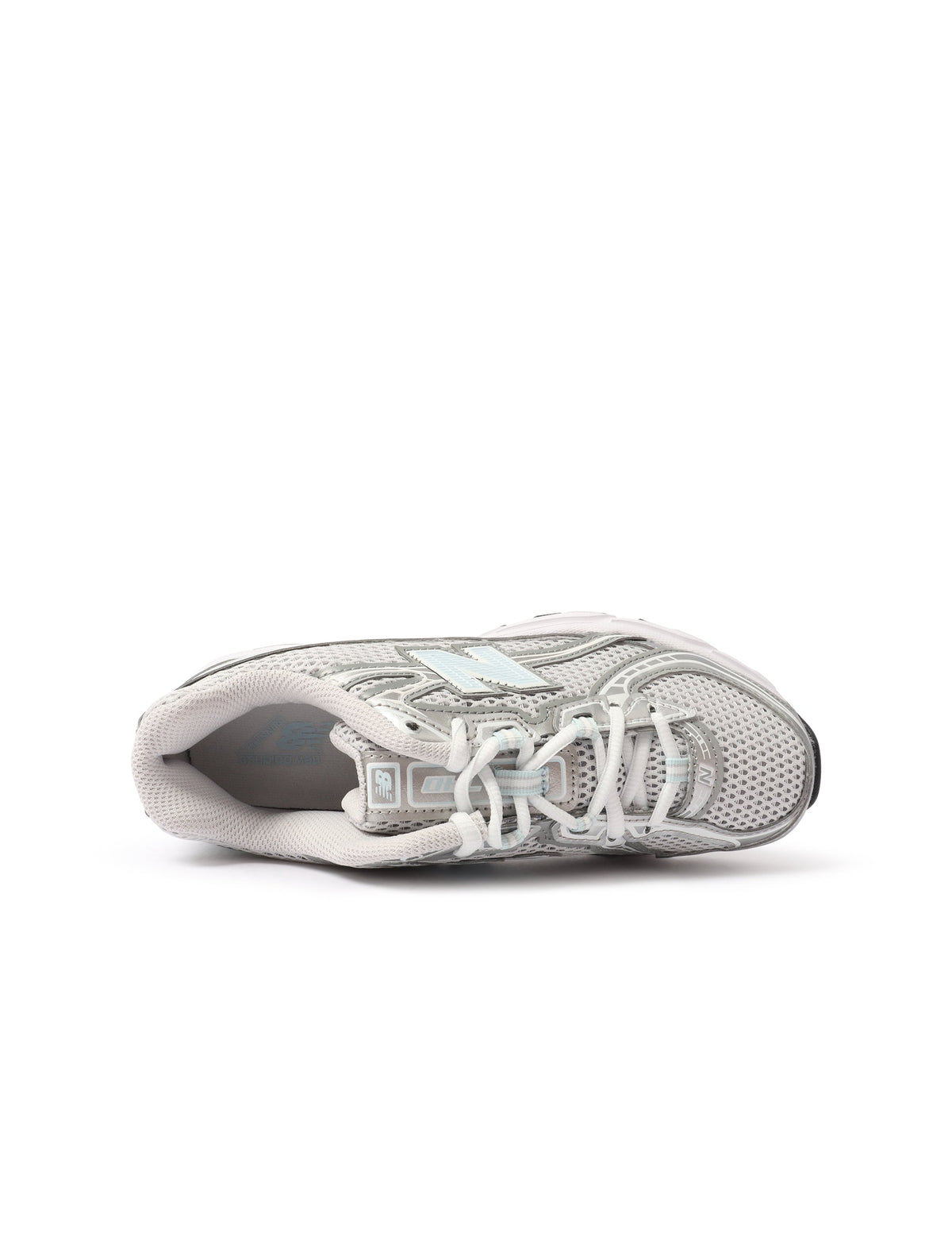 New Balance Women's 740 grey and light blue athletic footwear, casual sneakers with breathable mesh and cushioned soles.