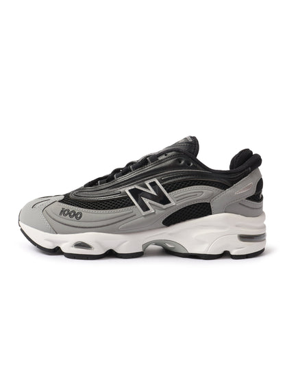Black and grey New Balance men's 1000N shoes showing side and top view, featuring mesh and synthetic overlays for athletic footwear.