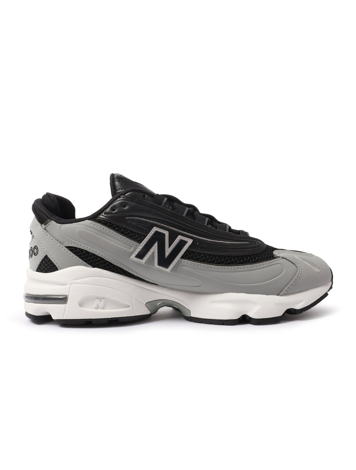 Black and grey New Balance men's 1000N shoes showcasing sporty design and sleek athletic footwear style.