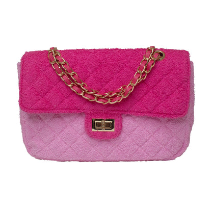 BEACH HAUS Small Shoreline Flap in two-tone pink, compact flap bag shown from the front