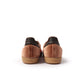 Adidas Women's Samba OG brown sneakers by Denim Exchange, side view showing classic low-top design and rubber sole