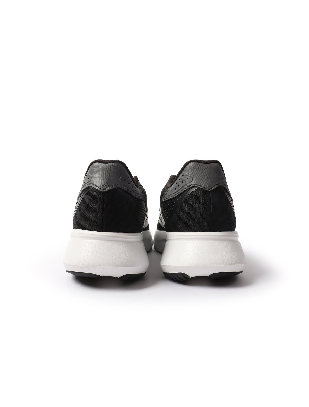 Black and white Adidas men's Duramo SL2 wide running shoes, showcasing mesh uppers and cushioned soles.