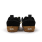 Vans men's Knu School sneakers in black and green with white soles, casual footwear style for men.