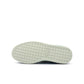 Blue and green Puma Women's Basket Grumpy Grouchy sneakers, stylish denim footwear for women, shown from a front angle.