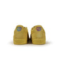 Yellow Puma Suede Love Marathon men's sneaker with white sole and Puma logo, styled for casual wear.