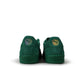 Green Puma Suede Love Marathon sneaker for men, featuring classic design and suede material, shown in a lifestyle setting.