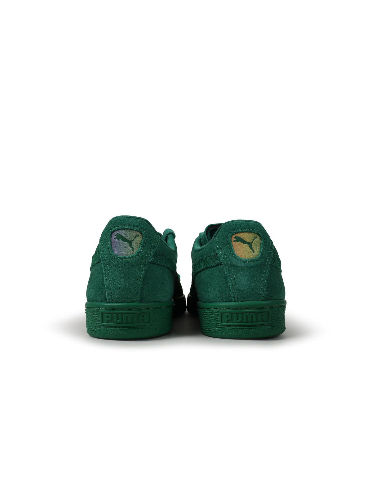 Green Puma Suede Love Marathon sneaker for men, featuring classic design and suede material, shown in a lifestyle setting.
