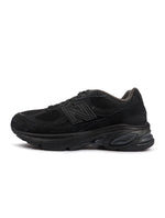 Men's New Balance 2010 black footwear by Denim Exchange, side view