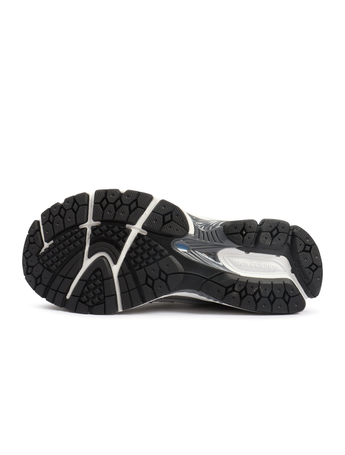 White and grey New Balance men's 1906 sneakers with mesh and leather accents, styled for casual wear.