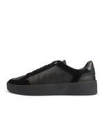 Black Hugo Lyde Tenn shoes for men, showcasing sleek leather footwear from Denim Exchange.