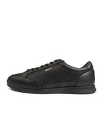 Black Hugo Boss Nitan Lowp men's shoes with sleek leather design, showcasing stylish footwear from Denim Exchange.