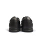 Black Hugo Boss Nitan Lowp men's shoes, stylish footwear with sleek design, displayed on a plain background.