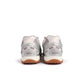 Women's New Balance 204L sneakers in Truffle Salt colorway, side view