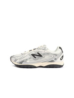New Balance women's 204L silver metallic footwear sneakers viewed from the side