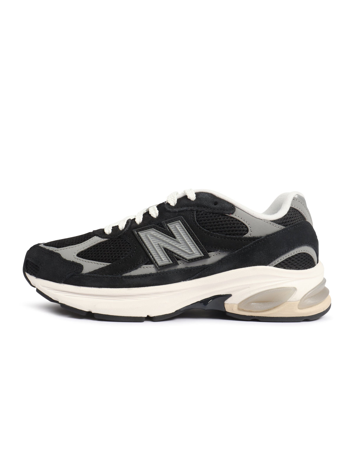Black men's New Balance Abzorb 2010 sneakers featuring supportive footwear with a sleek design and comfortable fit.