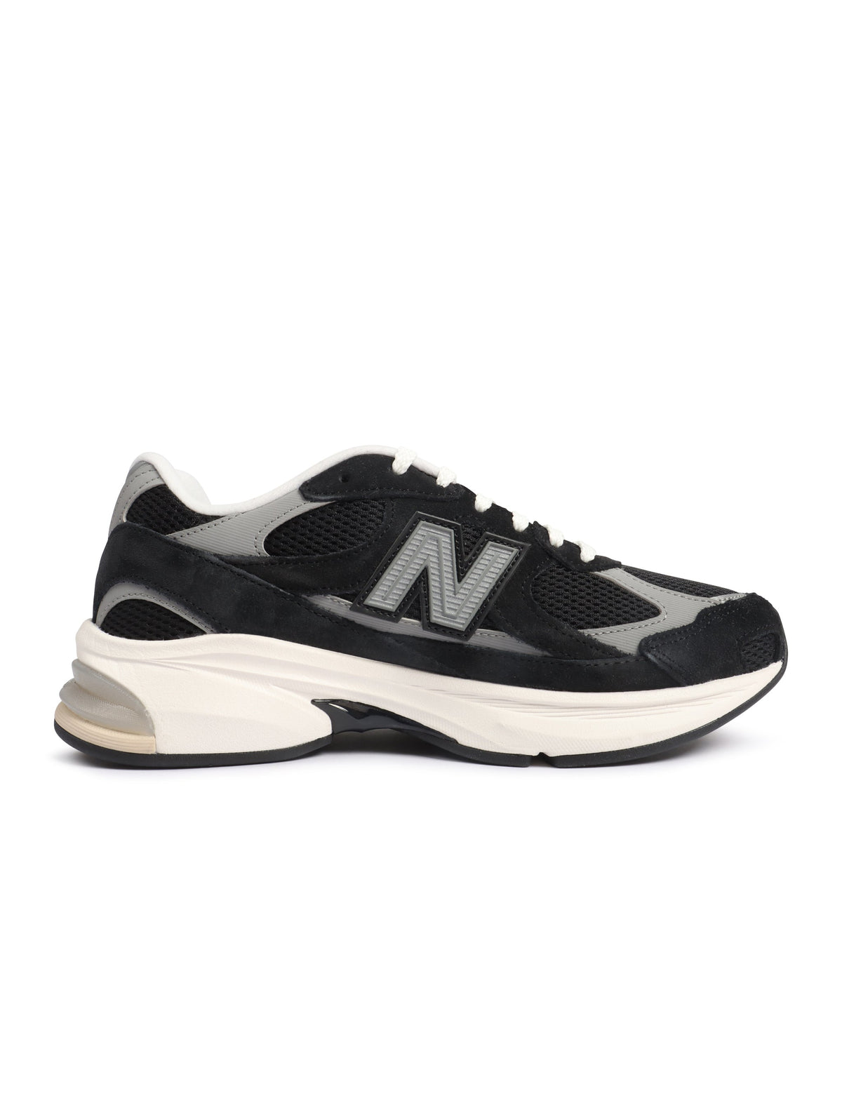 Black New Balance men's footwear with Abzorb cushioning, featuring sleek design and supportive sole, perfect for active wear.
